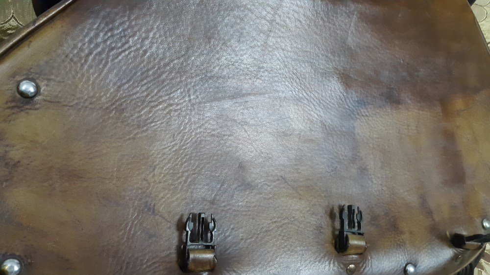 Luxury leather handbag care guide featuring maintenance tips for preserving leather quality and appearance.