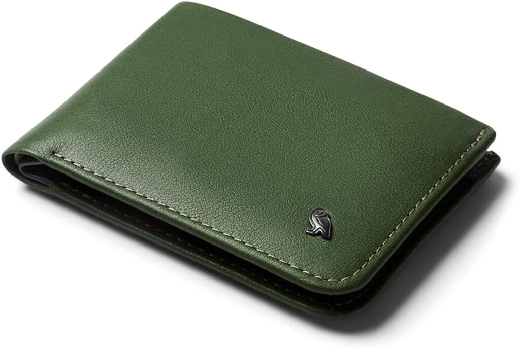 Premium green leather wallet showcasing smooth leather texture and minimalist design.